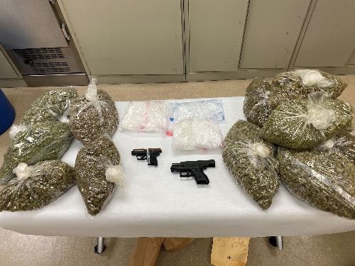 Bagged Marijuana-Two Handguns-.Methamphetamine