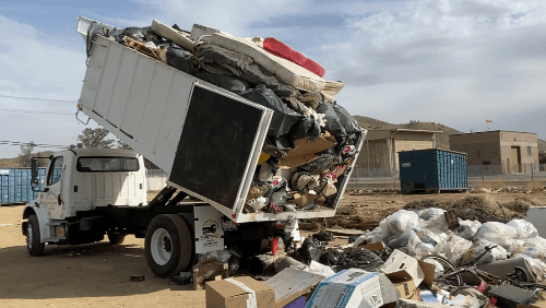 Truck Dumping Trash
