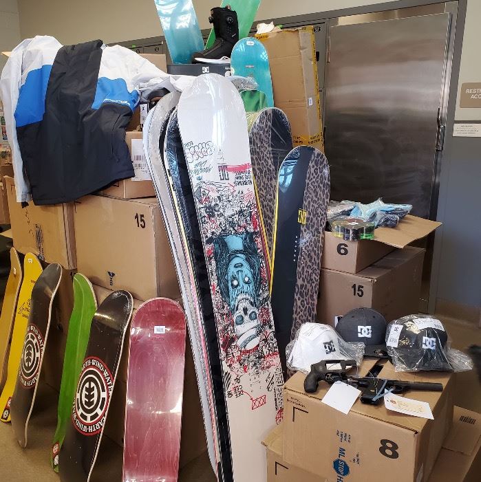 Snowboards-Skateboards-Guns-Hats-Boxes-White and Blue Jacket